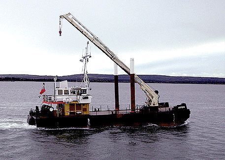 Avon multi-role vessel with spud legs and deck crane
