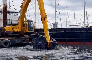 dredging underway at Haslar Marina with hopper barge nab