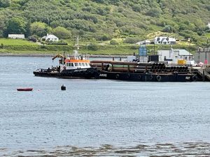 tugboat DMS Condor and JML30 working at Uig harbour redevelopment Scotland