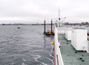 Sandbanks ferry held by utility vessel Buffalo