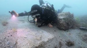 medieval grave slabs on the sea floor