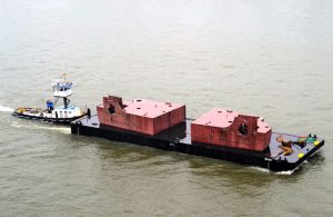 JML5019 pontoon barge transporting a cargo