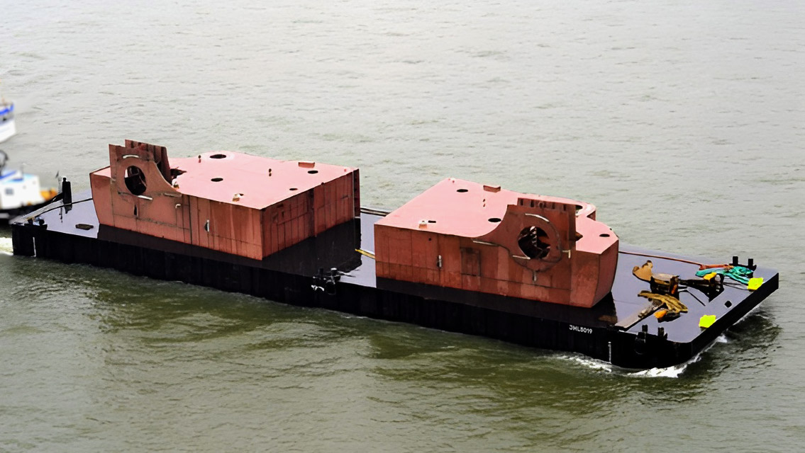 JML5019 pontoon barge transporting a large cargo